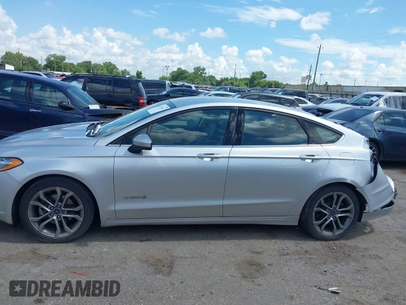 2017 Ford Fusion Hybrid SE with VIN 3FA6P0LU4HR234101, listed as a IAAI auction lot 42579447 with 169,273 mi miles and . Bid and sale history available at DreamBid. Image 14.