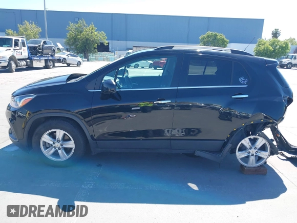 2019 Chevrolet Trax LT z VIN KL7CJLSB9KB912284, wystawiony jako IAAI lot #42298398 z przebiegiem 103 053 mil mil oraz . Historia ofert i sprzedaży dostępna na DreamBid. Obrazek 15.