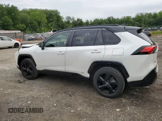 2019 Toyota RAV4 Hybrid XSE with VIN JTMEWRFV4KJ004433, listed as a Copart auction lot 58400445 with 101,108 mi miles and Salvage title. Bid and sale history available at DreamBid. Image 2.
