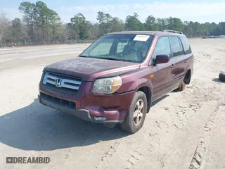 2007 Honda Pilot EX-L with VIN 5FNYF18747B008204, listed as a IAAI auction lot 41668603 with 223,213 mi miles. Bid and sale history available at carsss.com. Image 2.
