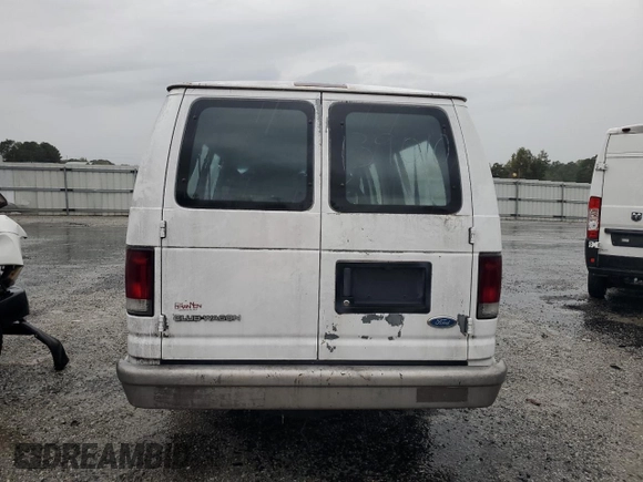 1996 Ford Econoline Wagon XL z VIN 1FBJS31H4THB69646, wystawiony jako Copart lot #73374364 z przebiegiem 83 635 mil mil oraz Tytuł czysty. Historia ofert i sprzedaży dostępna na DreamBid. Obrazek 6.