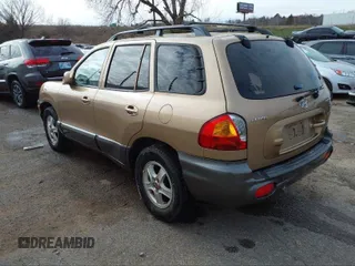 2004 Hyundai Santa Fe GLS with VIN KM8SC13D34U781837, listed as a IAAI auction lot 40452732 with 223,991 mi miles. Bid and sale history available at carsss.com. Image 3.