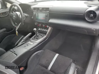 2022 Toyota GR86 Premium with VIN JF1ZNBE13N9757764, listed as a Copart auction lot 77310404 with 12,589 mi miles and Salvage Title. Bid and sale history available at carsss.com. Image 8.