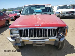 1992 Jeep Cherokee with VIN 1J4FJ58S0NL140995, listed as a Copart auction lot 56705875 with 253,657 mi miles and Salvage title. Bid and sale history available at DreamBid. Image 5.