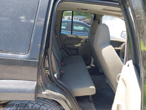 2006 Jeep Liberty Sport with VIN 1J4GK48K46W246801, listed as a IAAI auction lot 42048509 with 219,077 mi miles. Bid and sale history available at carsss.com. Image 8.