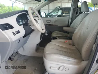 2012 Toyota Sienna XLE AAS с VIN 5TDYK3DC1CS240100, выставлен на аукционе Copart как лот 56975235 с пробегом 251 340 миль миль и Списание • Salvage title. История ставок и продаж доступна на DreamBid. Изображение 7.
