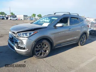 2018 Hyundai Santa Fe Ultimate z VIN 5XYZW4LA1JG515019, wystawiony jako IAAI lot #42248389 z przebiegiem 60 222 mil mil oraz . Historia ofert i sprzedaży dostępna na DreamBid. Obrazek 2.