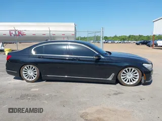2016 BMW 7 Series 740i with VIN WBA7E2C55GG547752, listed as a IAAI auction lot 41992704 with Not Provided miles and . Bid and sale history available at carsss.com. Image 12.