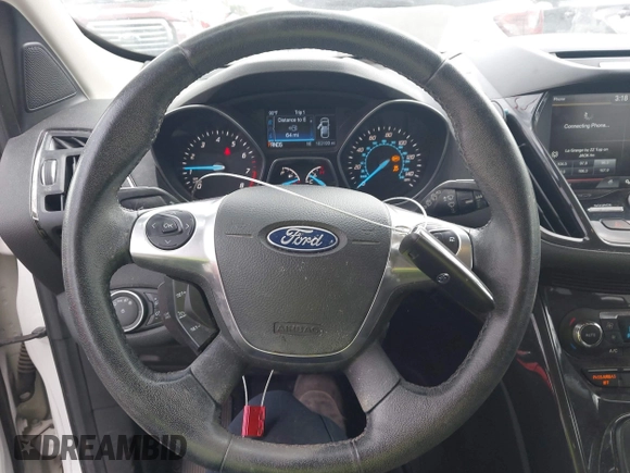 2015 Ford Escape Titanium with VIN 1FMCU0J99FUB92563, listed as a IAAI auction lot 42649556 with 183,199 mi miles and . Bid and sale history available at DreamBid. Image 11.