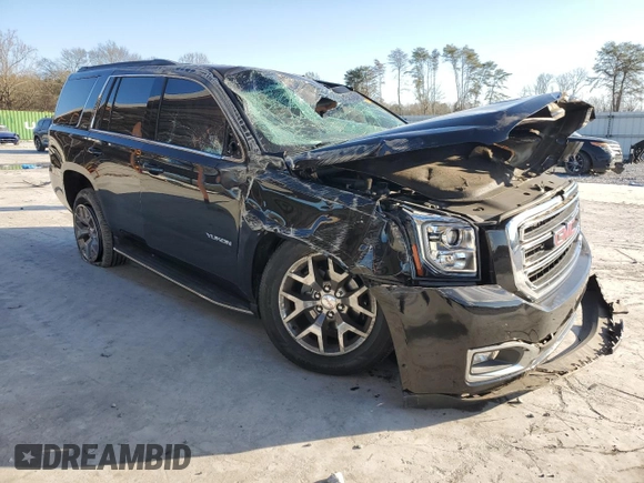 2019 GMC Yukon SLE with VIN 1GKS1AKC6KR302642, listed as a Copart auction lot 41510715 with 97,906 mi miles and Salvage Title. Bid and sale history available at carsss.com. Image 4.