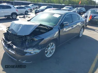2014 Nissan Maxima S with VIN 1N4AA5AP9EC467259, listed as a IAAI auction lot 41998190 with 157,055 mi miles and . Bid and sale history available at DreamBid. Image 17.