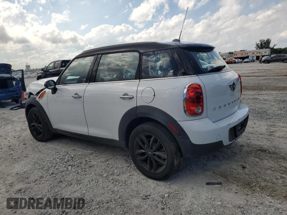 2013 MINI Countryman with VIN WMWZB3C5XDWM31715, listed as a Copart auction lot 57028565 with 95,453 mi miles and Salvage title. Bid and sale history available at DreamBid. Image 2.