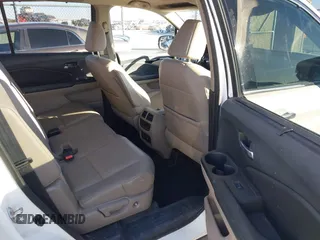 2017 Honda Pilot Touring with VIN 5FNYF6H93HB056387, listed as a IAAI auction lot 41095336 with 90,376 mi miles and . Bid and sale history available at DreamBid. Image 8.