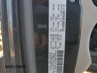 2015 Dodge Grand Caravan SXT with VIN 2C4RDGCG1FR556426, listed as a Copart auction lot 79807364 with 159,338 mi miles and Salvage Title. Bid and sale history available at DreamBid. Image 13.