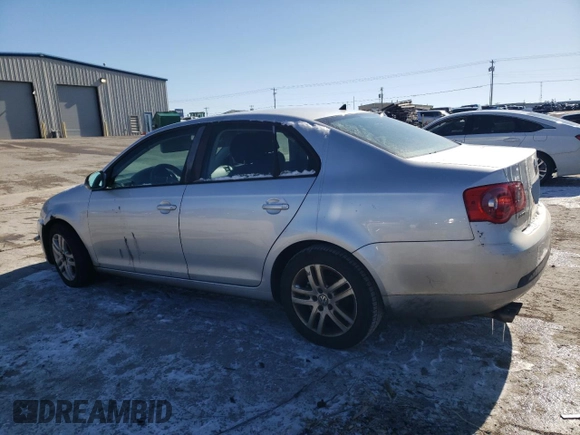 2007 Volkswagen Jetta z VIN 3VWHG71K27M111595, wystawiony jako Copart lot #42016995 z przebiegiem 155 565 mil mil oraz Czysty tytuł • Clean title. Historia ofert i sprzedaży dostępna na DreamBid. Obrazek 2.