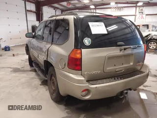 2003 GMC Envoy SLT z VIN 1GKDS13S932299354, wystawiony jako IAAI lot #41238557 z przebiegiem 251 535 mil mil oraz . Historia ofert i sprzedaży dostępna na DreamBid. Obrazek 3.