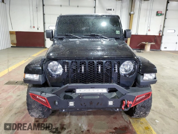 2021 Jeep Gladiator Willys with VIN 1C6HJTAG4ML556255, listed as a Copart auction lot 57143125 with 57,104 mi miles and Salvage title. Bid and sale history available at DreamBid. Image 5.