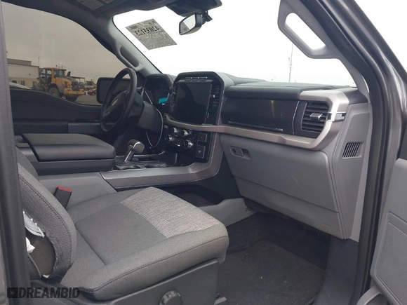 2023 Ford F-150 Lightning Pro with VIN 1FTVW1EL8PWG48559, listed as a IAAI auction lot 42033123 with 8,845 mi miles. Bid and sale history available at carsss.com. Image 5.