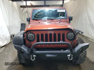 2014 Jeep Wrangler Sport with VIN 1C4AJWAG7EL197285, listed as a Copart auction lot 63451105 with 141,547 mi miles and Salvage title. Bid and sale history available at DreamBid. Image 5.