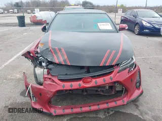 2016 Scion tC with VIN JTKJF5C74GJ026588, listed as a IAAI auction lot 41582253 with 74,023 mi miles. Bid and sale history available at carsss.com. Image 6.