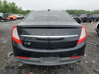 2015 Lincoln MKS z VIN 1LNHL9DK1FG601889, wystawiony jako Copart lot #60241635 z przebiegiem 249 283 mil mil oraz Czysty tytuł • Clean title. Historia ofert i sprzedaży dostępna na DreamBid. Obrazek 6.