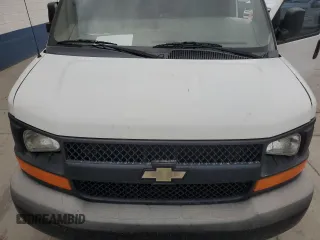 2012 Chevrolet Express Cargo z VIN 1GCWGFCAXC1177408, wystawiony jako Copart lot #64615955 z przebiegiem Nie podano mil oraz Czysty tytuł • Clean title. Historia ofert i sprzedaży dostępna na DreamBid. Obrazek 11.