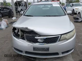 2013 Kia Forte LX with VIN KNAFT4A21D5739585, listed as a IAAI auction lot 42097213 with 195,500 mi miles. Bid and sale history available at carsss.com. Image 13.