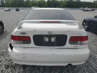 1999 Honda Civic DX with VIN 1HGEJ6223XL076584, listed as a Copart auction lot 51202925 with 282,306 mi miles and Salvage Title. Bid and sale history available at DreamBid. Image 6.
