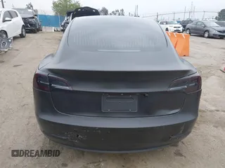 2019 Tesla Model 3 Mid Range with VIN 5YJ3E1EA8KF538083, listed as a IAAI auction lot 41891458 with 46,958 mi miles and . Bid and sale history available at carsss.com. Image 16.