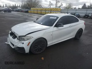 2014 BMW 2 Series M235i with VIN WBA1J7C52EVX33739, listed as a Copart auction lot 81215764 with 0 mi miles and Salvage Title. Bid and sale history available at carsss.com. Image 1.