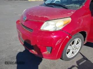 2008 Scion xD with VIN JTKKU10408J027767, listed as a IAAI auction lot 42057994 with 207,212 mi miles. Bid and sale history available at carsss.com. Image 6.