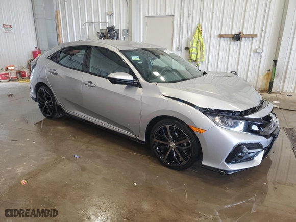 2021 Honda Civic Hatchback Sport with VIN SHHFK7H48MU231769, listed as a Copart auction lot 50828865 with 31,286 mi miles and Salvage Title. Bid and sale history available at carsss.com. Image 4.