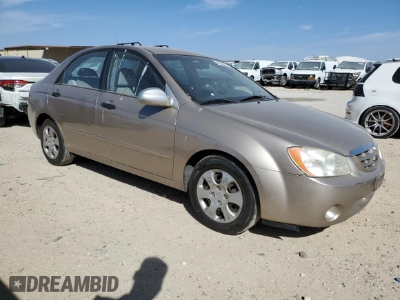 2006 Kia Spectra EX with VIN KNAFE121565364950, listed as a Copart auction lot 48860895 with 209,615 mi miles and Salvage Title. Bid and sale history available at DreamBid. Image 4.
