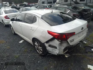 2011 Kia Optima EX with VIN KNAGN4A65B5143331, listed as a IAAI auction lot 28176669 with 162,919 mi miles and . Bid and sale history available at carsss.com. Image 3.