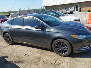 2018 Ford Fusion SE with VIN 3FA6P0HD9JR231709, listed as a IAAI auction lot 42062198 with 65,971 mi miles and . Bid and sale history available at carsss.com. Image 13.