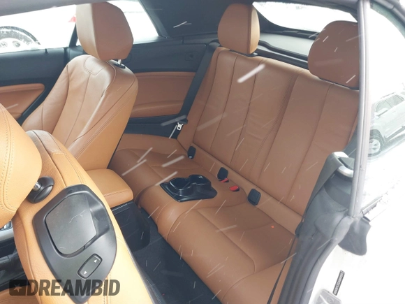 2018 BMW 2 Series 230i xDrive with VIN WBA2K1C52JVB64595, listed as a IAAI auction lot 41604748 with 47,461 mi miles and . Bid and sale history available at DreamBid. Image 8.