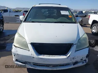 2005 Honda Odyssey EX with VIN 5FNRL38465B081716, listed as a IAAI auction lot 41998956 with 173,182 mi miles and . Bid and sale history available at carsss.com. Image 13.