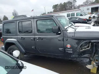 2019 Jeep Wrangler Unlimited Sport S with VIN 1C4HJXDG5KW505015, listed as a IAAI auction lot 41560088 with 54,193 mi miles and . Bid and sale history available at DreamBid. Image 13.