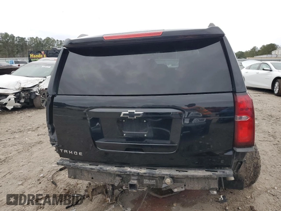 2020 Chevrolet Tahoe LS z VIN 1GNSCAKC1LR280726, wystawiony jako Copart lot #43128095 z przebiegiem 89 050 mil mil oraz Szkoda całkowita • Salvage title. Historia ofert i sprzedaży dostępna na DreamBid. Obrazek 6.