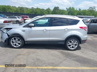 2014 Ford Escape Titanium with VIN 1FMCU0JX7EUA28824, listed as a IAAI auction lot 42065325 with 107,761 mi miles. Bid and sale history available at carsss.com. Image 14.
