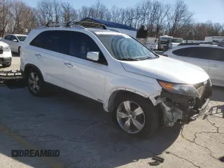 2012 Kia Sorento EX z VIN 5XYKUDA23CG291368, wystawiony jako Copart lot #42061635 z przebiegiem 134 472 mil mil oraz Szkoda całkowita • Salvage title. Historia ofert i sprzedaży dostępna na DreamBid. Obrazek 4.