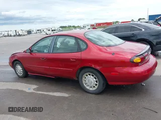 1996 Ford Taurus LX with VIN 1FALP53S2TA221249, listed as a IAAI auction lot 42506786 with 198,272 mi miles and . Bid and sale history available at DreamBid. Image 14.