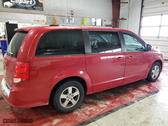 2012 Dodge Grand Caravan SXT with VIN 2C4RDGCG7CR202924, listed as a Copart auction lot 44713205 with 83,573 mi miles and Salvage Title. Bid and sale history available at carsss.com. Image 3.