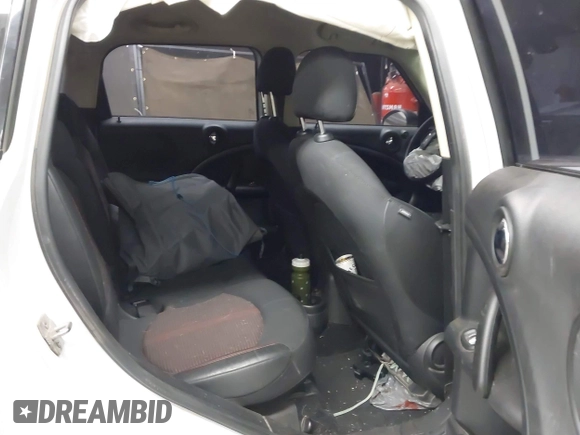 2015 MINI Countryman S with VIN WMWZC5C53FWT37722, listed as a IAAI auction lot 42151891 with 110,488 mi miles and . Bid and sale history available at DreamBid. Image 8.