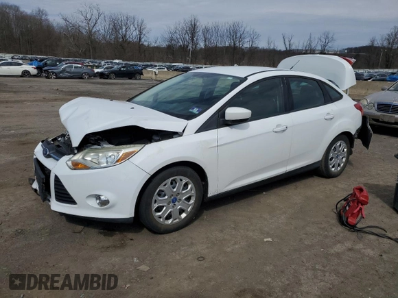 2012 Ford Focus SE with VIN 1FAHP3F25CL213172, listed as a Copart auction lot 51518755 with 67,520 mi miles and Salvage Title. Bid and sale history available at carsss.com. Image 1.