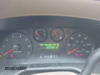 2005 Ford Taurus SE with VIN 1FAFP53215A127489, listed as a IAAI auction lot 40940239 with 127,180 mi miles. Bid and sale history available at carsss.com. Image 7.