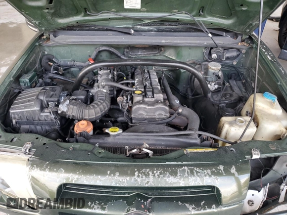 2000 Suzuki Vitara JLS z VIN 2S3TE52VXY6110157, wystawiony jako Copart lot #79173714 z przebiegiem 165 283 mil mil oraz Nie do naprawy • Non repairable. Historia ofert i sprzedaży dostępna na DreamBid. Obrazek 11.
