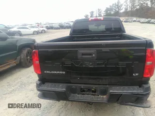 2021 Chevrolet Colorado 2WD LT with VIN 1GCHSCEA4M1256299, listed as a IAAI auction lot 41173669 with 90,969 mi miles and . Bid and sale history available at DreamBid. Image 16.