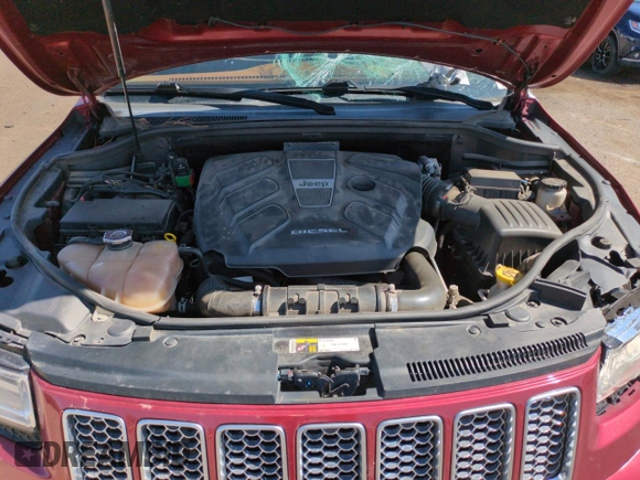 2015 Jeep Grand Cherokee Summit with VIN 1C4RJFJM6FC833687, listed as a Copart auction lot 59620695 with 110,074 mi miles and Salvage title. Bid and sale history available at DreamBid. Image 11.
