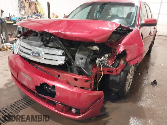 2009 Ford Taurus SEL with VIN 1FAHP24W89G123452, listed as a IAAI auction lot 41335622 with 229,182 mi miles. Bid and sale history available at carsss.com. Image 6.